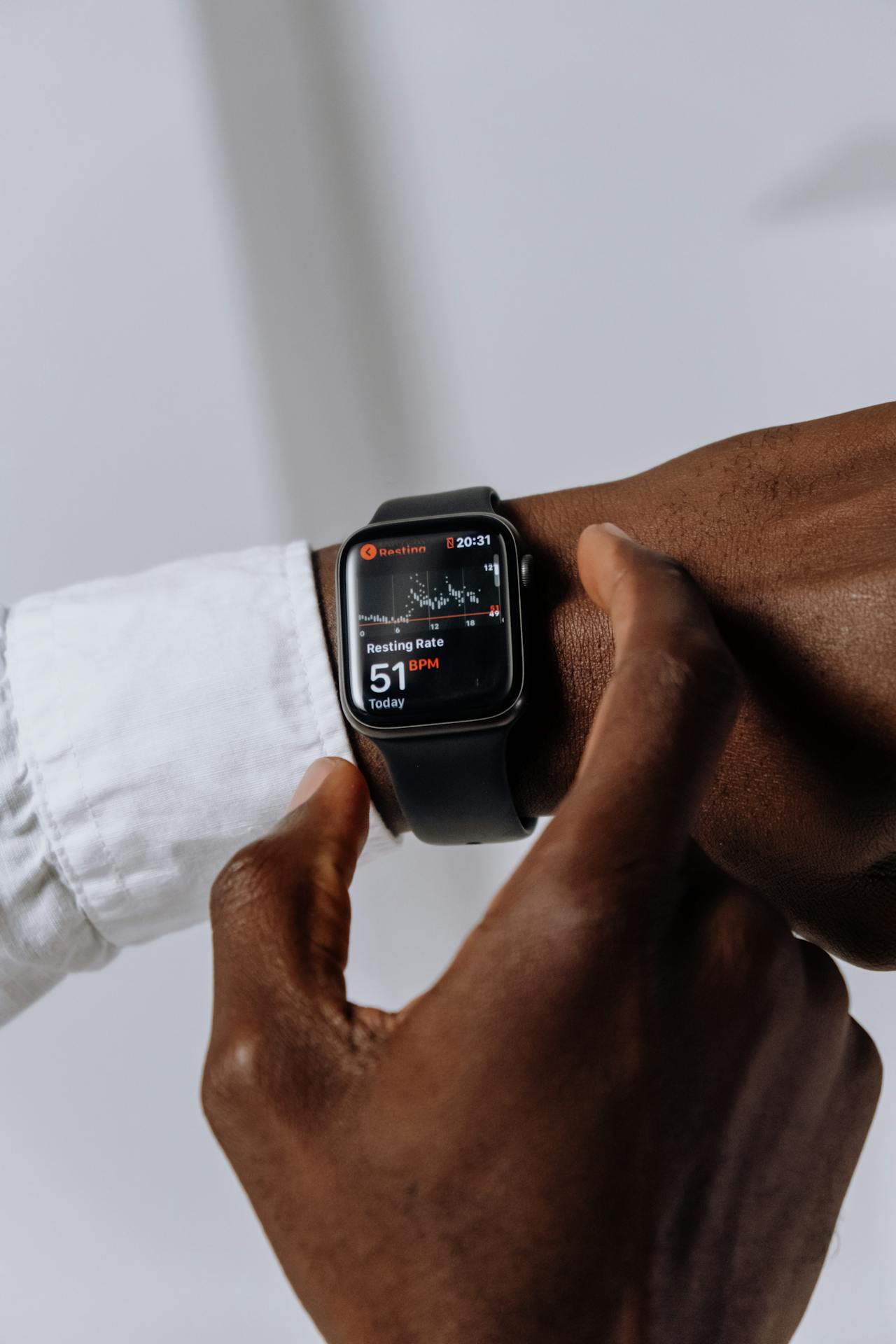 Person checking heart rate on Apple Watch